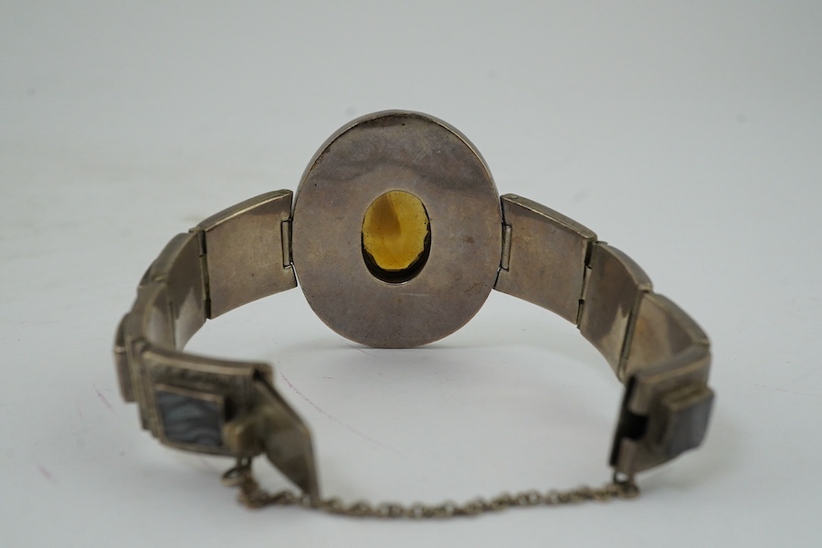 A late Victorian white metal, citrine and Scottish hardstone set bracelet. Condition - poor to fair